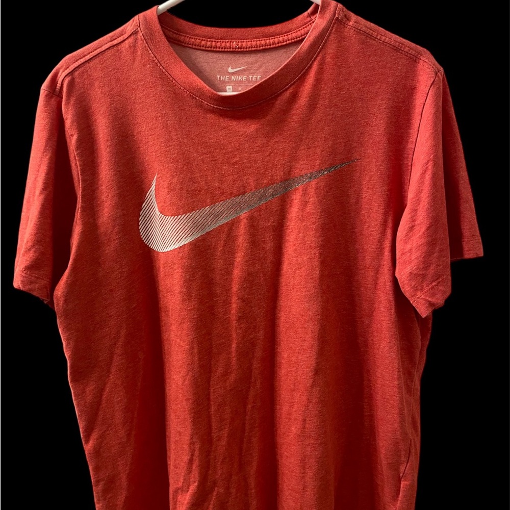 Men's red Nike tee shirt.